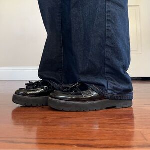 Black Loafers with Tassel Detail